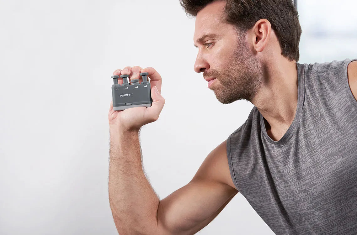 Exerciseur de main PINO (résistance de 1,1 à 2,7 kg) 
