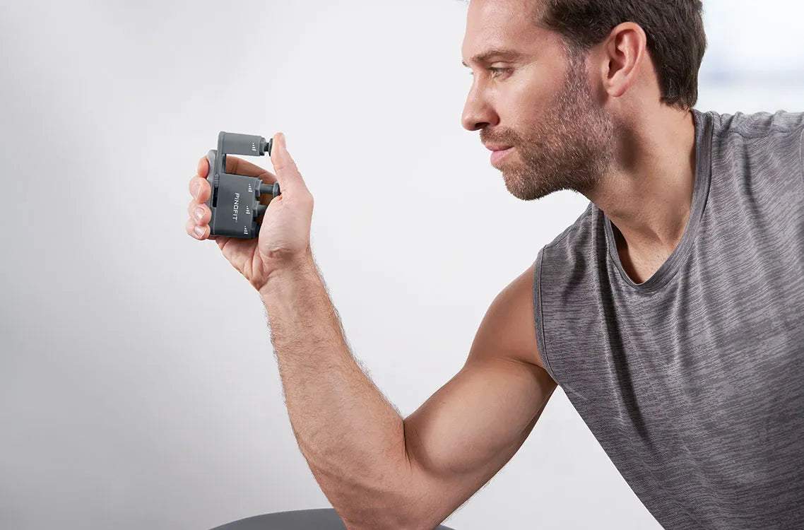 Exerciseur de main PINO (résistance de 1,1 à 2,7 kg) 